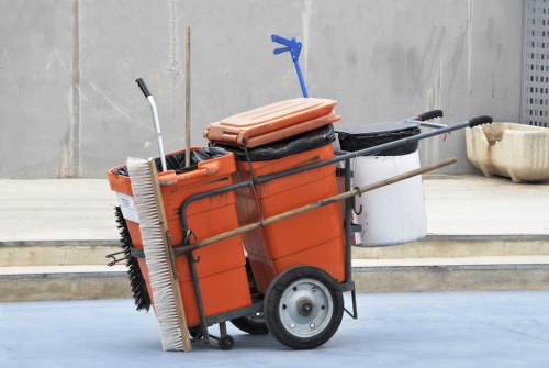 Waste collection vehicle at depot exterior