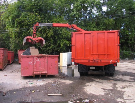 Collection crew sorting recyclables outside a Balham business